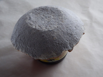 cast paper bowl covered with papier maché clay