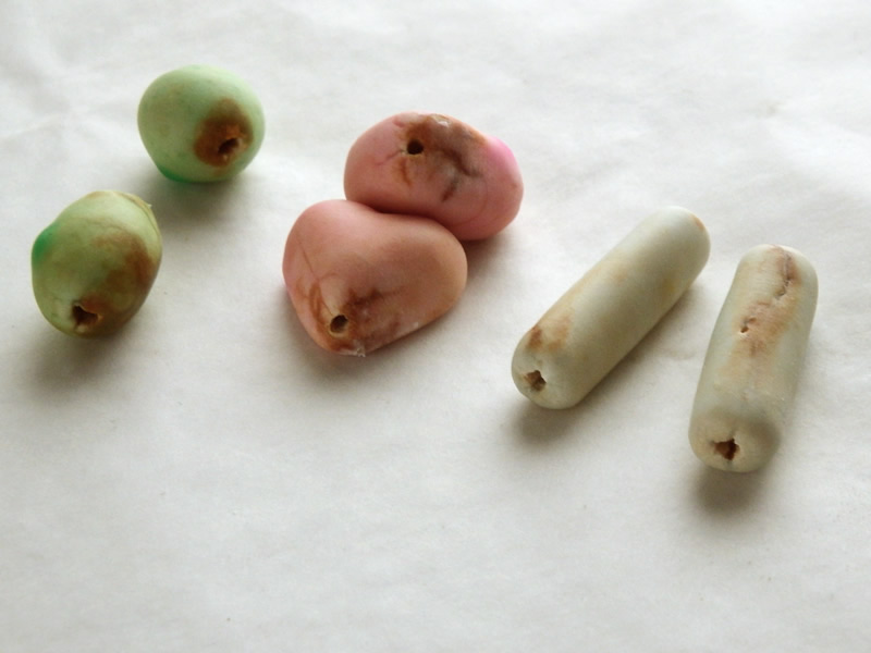 Cornstarch and baking soda beads covered with Translucent Liquid Sculpey