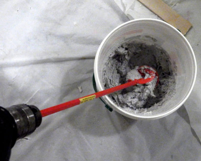 Papier maché clay ingredients with paint mixer